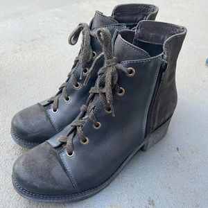 NAOT leather zip up/laced bottles with removable cork footbed and arch support.